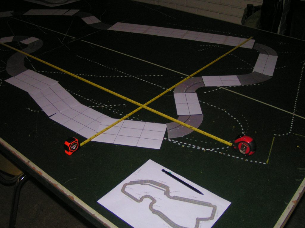Measuring the track dimensions.